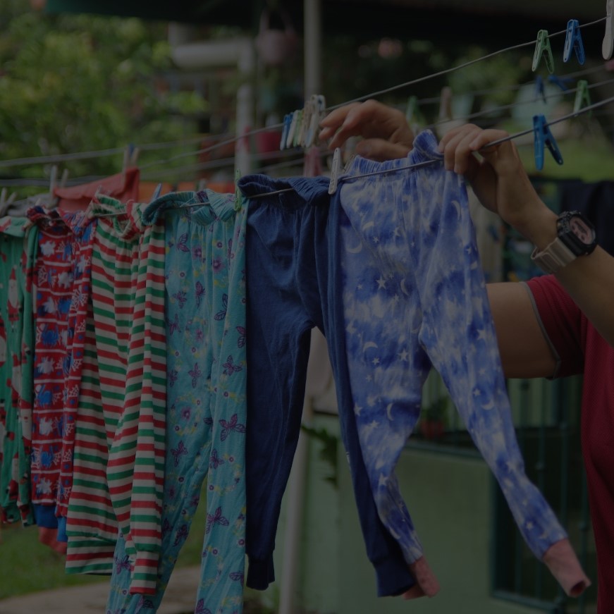 clothes on a line outside of a building